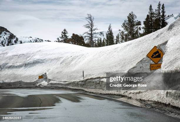 Canyons of snow greet drivers on Highway 88 as they cross the Sierra Nevada Crest over Carson Pass on April 8 near South Lake Tahoe, California. With...