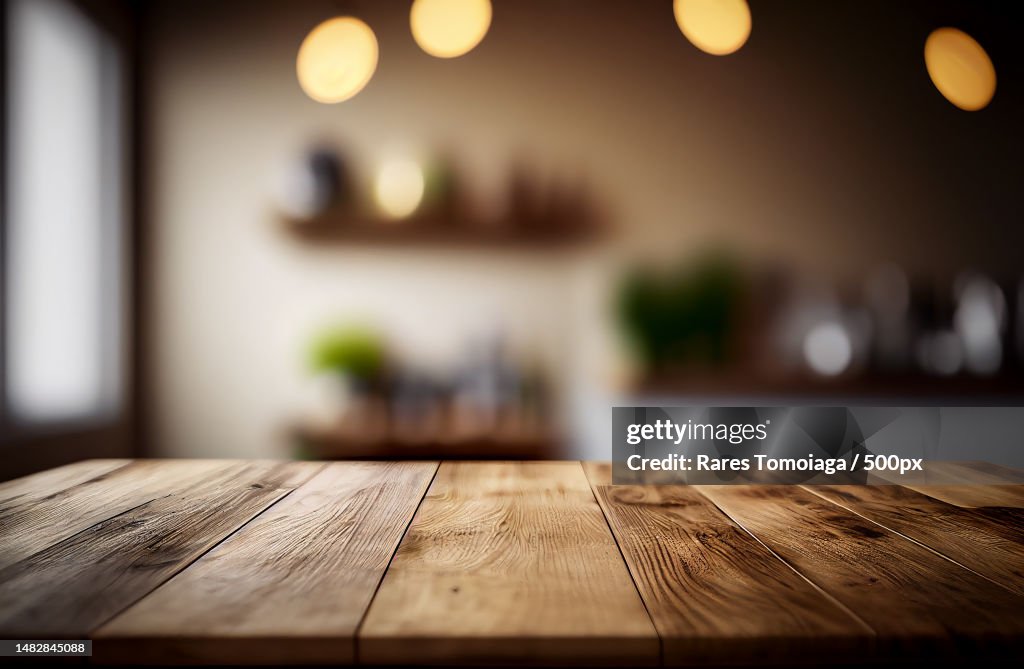 Abstract empty wooden desk table with copy space over interior modern room with blurred background,Romania