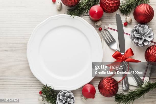 flat lay christmas tableware with empty plate high quality and resolution beautiful photo concept,romania - moments daily life from above photos et images de collection
