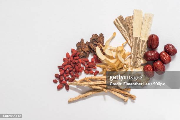 traditional chinese herbs used in alternative herbal medicine,taman puchong utama,malaysia - chinese herbal medicine stock pictures, royalty-free photos & images