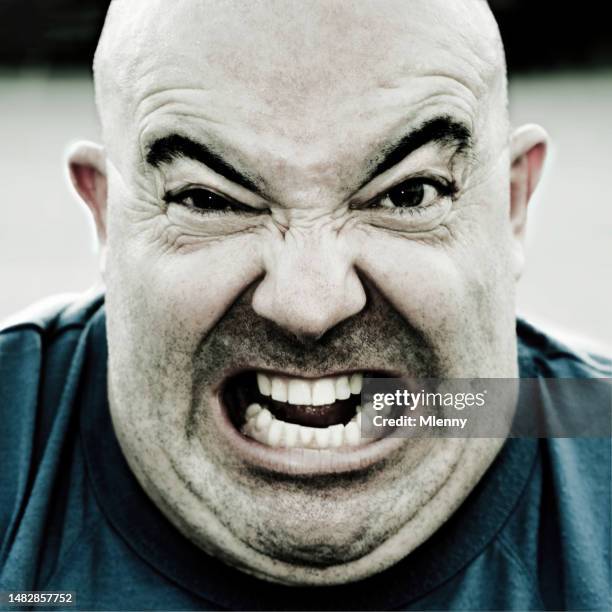 berzerk. showing teeth screaming bald man portrait - jagged teeth stock pictures, royalty-free photos & images
