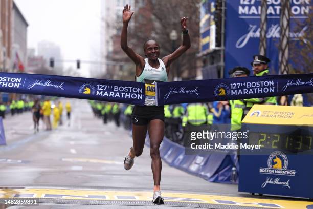 Hellen Obiri of Kenya crosses the finish line and takes first place in the professional Women's Division during the 127th Boston Marathon on April...