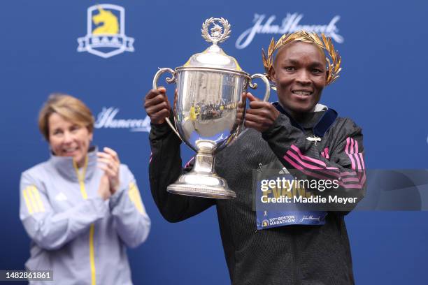 Evans Chebet of Kenya poses with the trophy after winning the professional Men's Division during the 127th Boston Marathon on April 17, 2023 in...