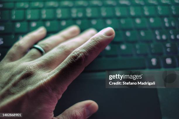 hand on the pc keyboard - tastiera di computer foto e immagini stock