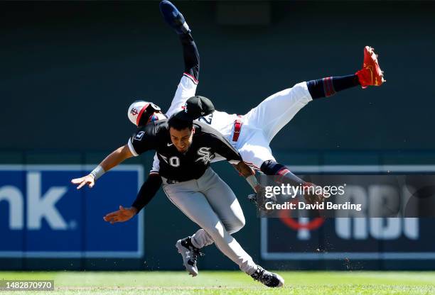 Byron Buxton of the Minnesota Twins collides with Lenyn Sosa of the Chicago White Sox in the seventh inning of the game at Target Field on April 12,...