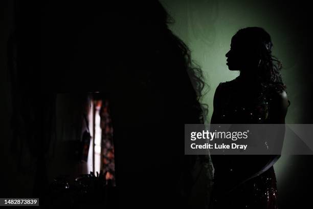 Transgender sex worker poses for a portrait at her home on April 17, 2023 in Kampala, Uganda. The Ugandan parliament recently revisited the country's...