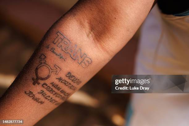 Tattoo as seen on a transgender man's arm on April 17, 2023 in Kampala, Uganda. The Ugandan parliament recently revisited the country's anti-gay bill...