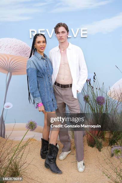 Lucky Blue Smith and Nara Aziza attend REVOLVE Festival 2023, Thermal, CA - Day 2 on April 16, 2023 in Thermal, California.