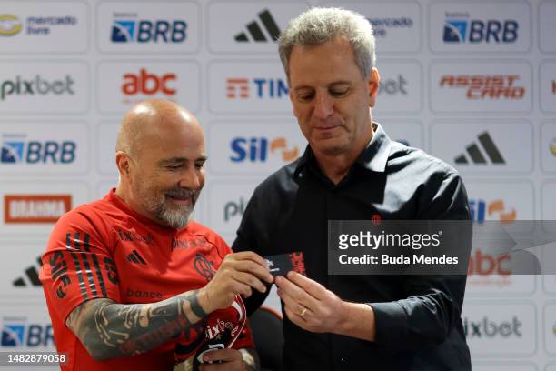 Newly appointed coach of Flamengo Jorge Sampaoli receives the fan membership card from the hands of Rodolfo Landim, president of Flamengo during his...