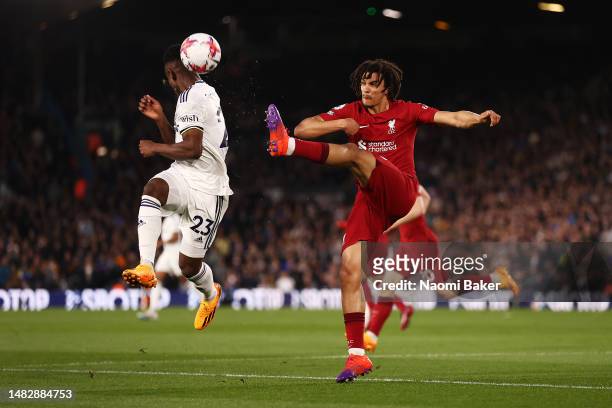 Trent Alexander-Arnold of Liverpool attempts to control the ball whilst under pressure from Luis Sinisterra of Leeds United during the Premier League...