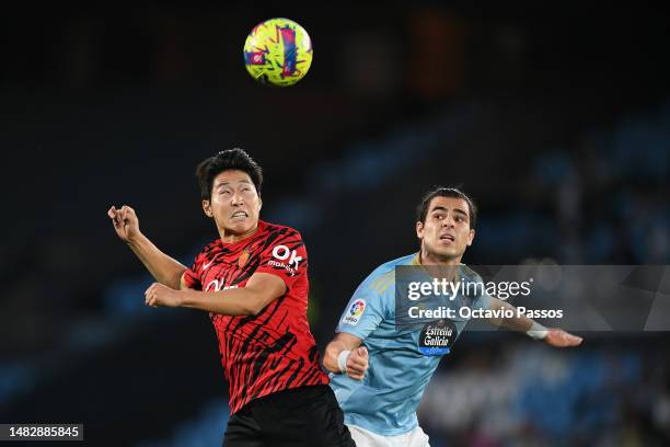 Lee Kang-In of RCD Mallorca and Miguel Rodriguez of RC Celta battle for the ball during the LaLiga Santander match between RC Celta and RCD Mallorca...