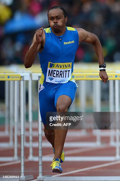 Althete Aries Merritt competes in the men's 110m hurdles round 1 heat 2 at the 2012 Diamond League athletics meet at Crystal Palace in London on July...