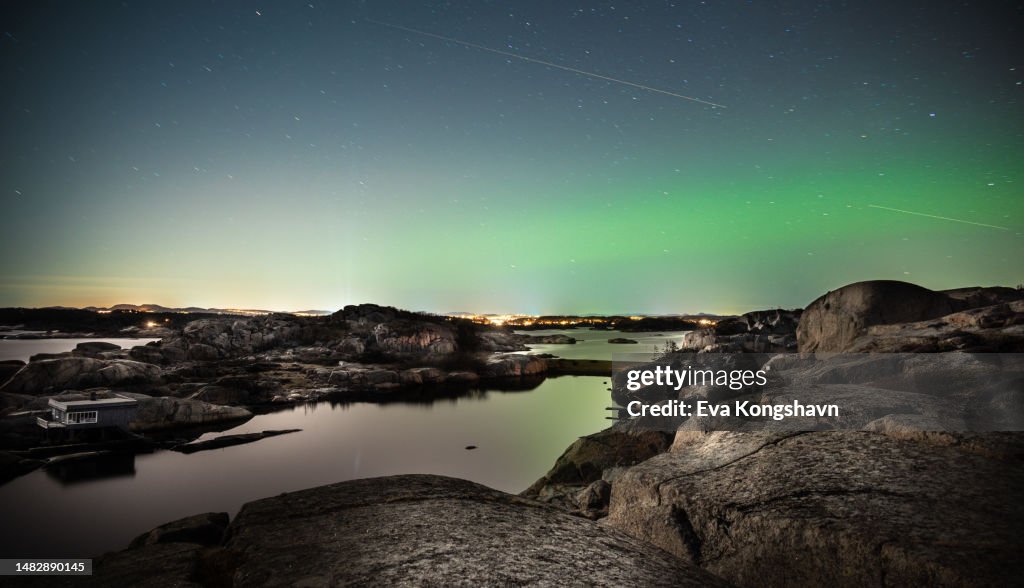 Aurora light reflects in the ocean