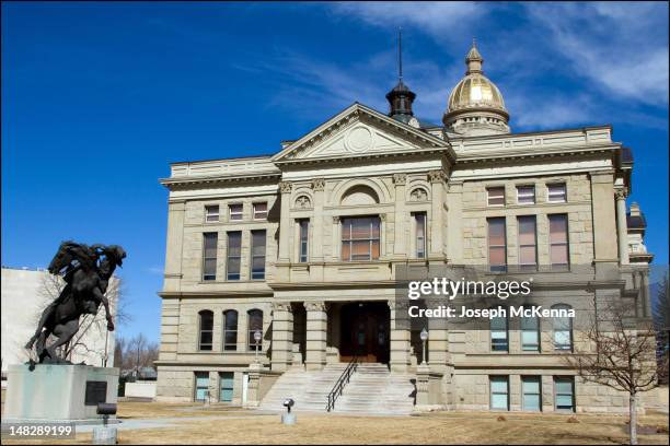 wyoming capital building with cowboy - cheyenne wyoming stock pictures, royalty-free photos & images