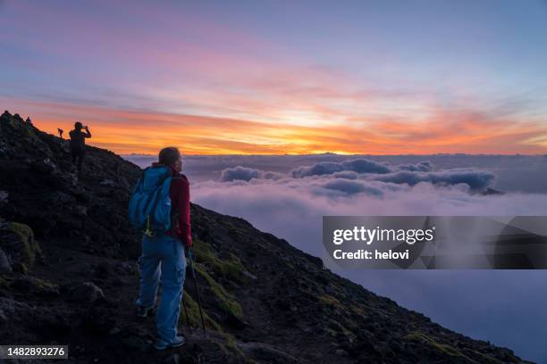 trail at sunrise on the top of volcano mt. pico - azores stock pictures, royalty-free photos & images