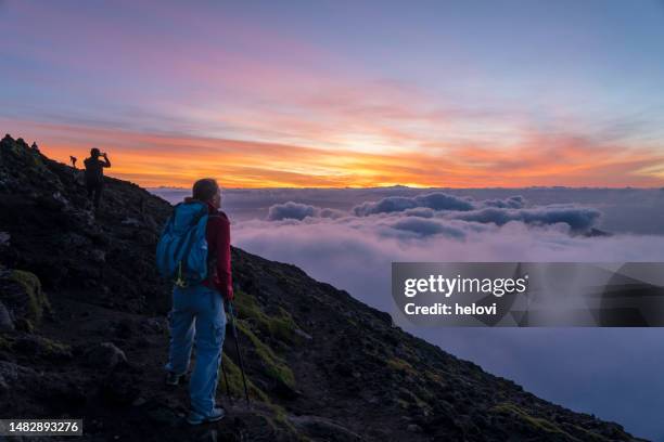 trail at sunrise on the top of volcano mt. pico - pico azores imagens e fotografias de stock