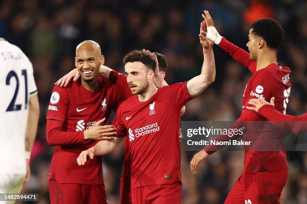 Diogo Jota of Liverpool celebrates with teammates after scoring the team's fifth goal during the Premier League match between Leeds United and...