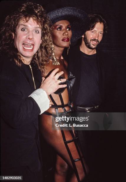 English Singer Ozzy Osbourne, performer Grace Jones and English guitarist Eric Clapton attend The International Rock Awards on May 31, 1989 at the...