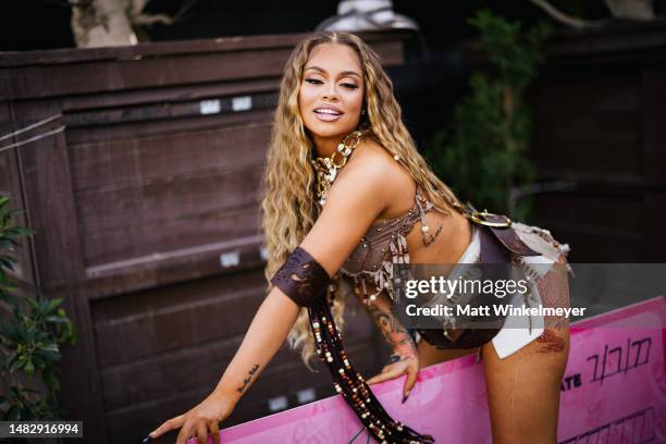 Latto poses for a portrait backstage at the Sahara tent during the 2023 Coachella Valley Music and Arts Festival on April 16, 2023 in Indio,...