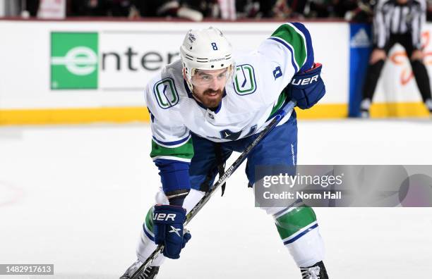 Conor Garland of the Vancouver Canucks gets ready during a face off against the Arizona Coyotes at Mullett Arena on April 13, 2023 in Tempe, Arizona.