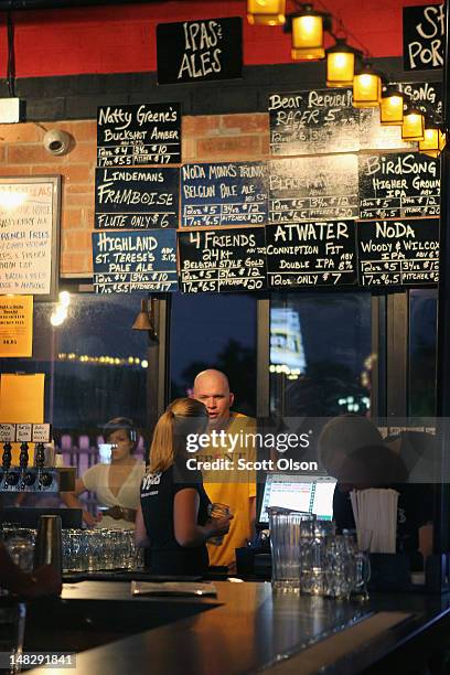 Customer orders a drink at VBGB on July 12, 2012 in Charlotte, North Carolina. VBGB is a beer hall and garden located in the NC Music Factory. The NC...