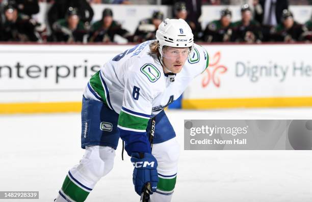 Brock Boeser of the Vancouver Canucks gets ready during a face off against the Arizona Coyotes at Mullett Arena on April 13, 2023 in Tempe, Arizona.