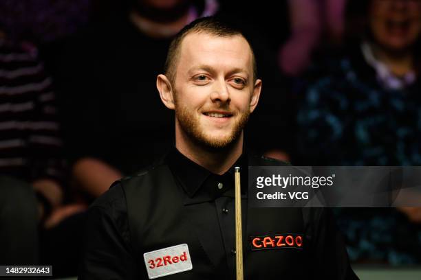 Mark Allen of Northern Ireland reacts in the first round match against Fan Zhengyi of China on day 3 of the 2023 Cazoo World Championship at Crucible...