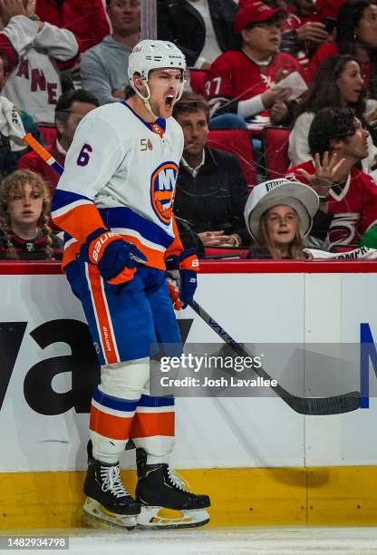 Ryan Pulock of the New York Islanders celebrates after scoring a goal during the second period against the Carolina Hurricanes in Game One of the...