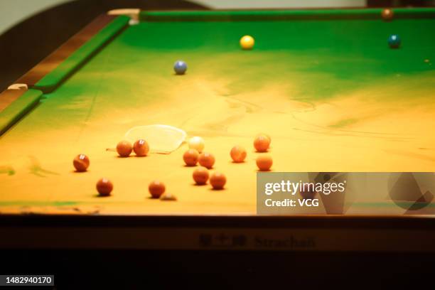 Orange powder thrown by a Just Stop Oil protester is seen on the table during the first round match between Robert Milkins and Joe Perry on day 3 of...