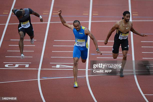 Althete Aries Merritt finishes ahead of US althete Jason Richardson and US athlete Jeff Porter to win the men's 110m hurdles final at the 2012...