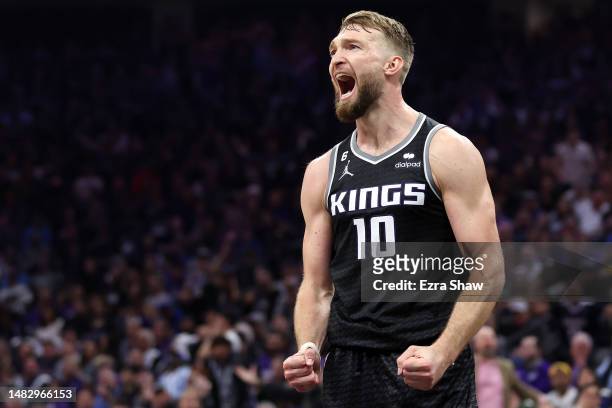 Domantas Sabonis of the Sacramento Kings reacts after missing a basket against the Golden State Warriors in the first half of Game Two of the Western...