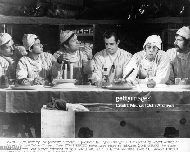 Tom Skerritt makes last toast John Schuck who plans suicide after Last Supper attended by Carl Gottlieb, David Arkin, Donald Sutherland and Elliot...