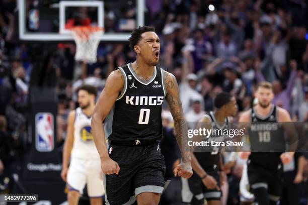 Malik Monk of the Sacramento Kings reacts after De'Aaron Fox of the Sacramento Kings made a three-point basket in the fourth quarter against the...