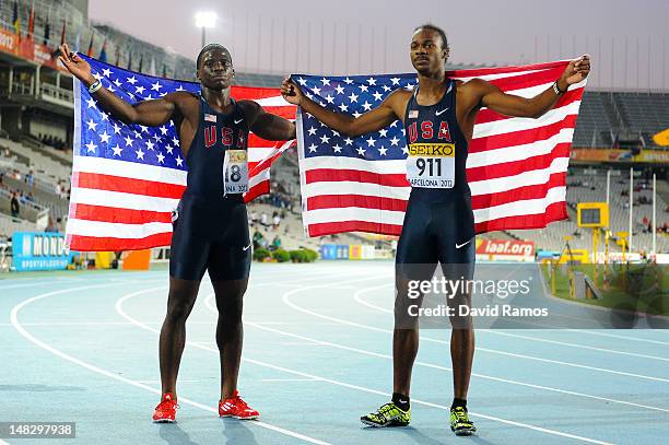 Aaron Ernest and Tyreek Hill of United States celebrate after being second and third on the Men's 200 metres Final on the day four of the 14th IAAF...