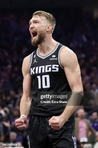 Domantas Sabonis of the Sacramento Kings reacts after missing a basket against the Golden State Warriors in the first half of Game Two of the Western...