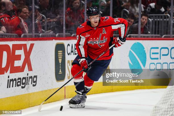 John Carlson of the Washington Capitals skates with the puck against the New Jersey Devils during the first period of the game at Capital One Arena...