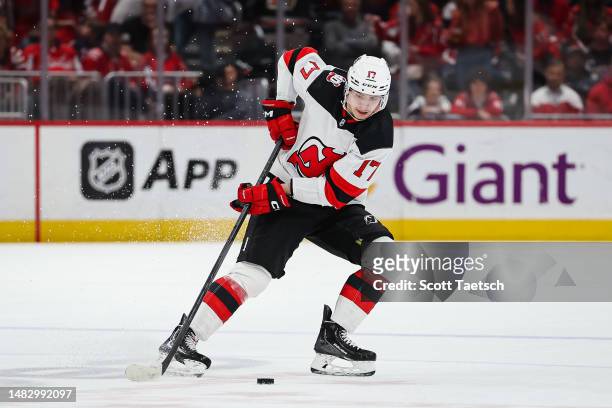 Yegor Sharangovich of the New Jersey Devils skates with the puck against the Washington Capitals during the first period of the game at Capital One...