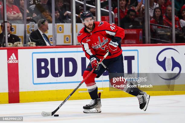 Tom Wilson of the Washington Capitals skates with the puck against the New Jersey Devils during overtime of the game at Capital One Arena on April...