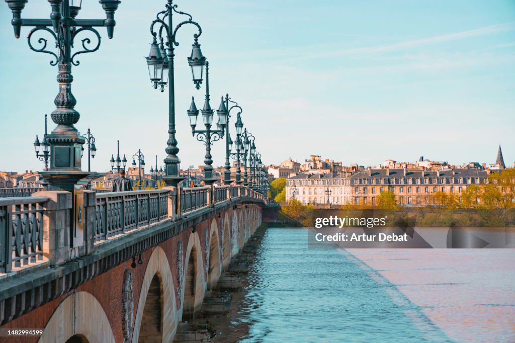 The city of Bordeaux with Le Pont de Pierre crossing the Garonne river.