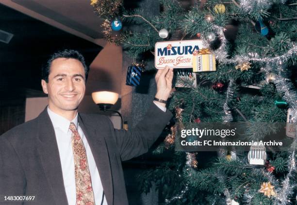 Appiano Gentile - Season 1989-1990 - - Riccardo Ferri of FC Internazionale poses next to the Christmas tree set up by Misura for the Christmas dinner...