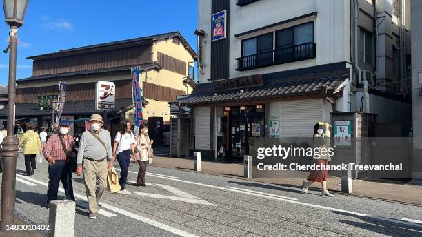 walking street (omotesando street) to naritasan shinsho-ji temple - narita temple stock pictures, royalty-free photos & images