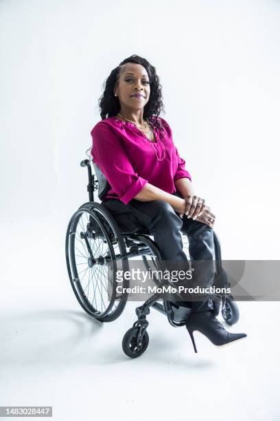 portrait of female fashion designer/business owner on white cyclorama - paraplegic woman 個照片及圖片檔