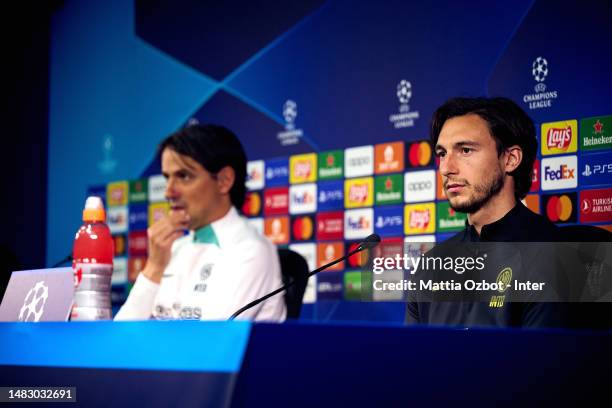 Head Coach Simone Inzaghi of FC Internazionale and Darmian Matteo of FC Internazionale speaks with the media during the press conference ahead of...