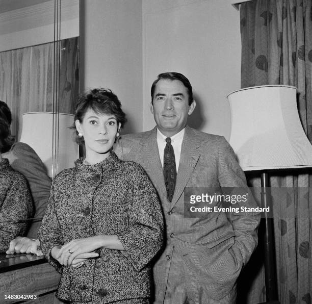 Actor Gregory Peck with his wife Veronique Peck in London to promote the film 'On The Beach', December 22nd 1959.