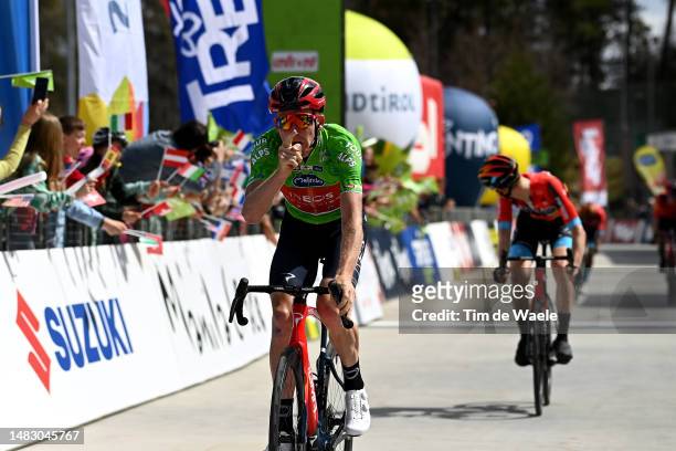 Tao Geoghegan Hart of United Kingdom and Team INEOS Grenadiers - Green leader jersey celebrates at finish line as stage winner during the 46th Tour...