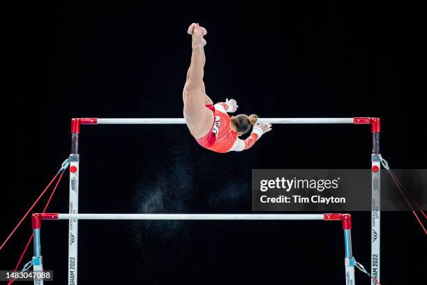 Georgia-Mae Fenton of England performs her gold medal-winning routine in the Women's Uneven Bars - Final during Artistic Gymnastics competition at...