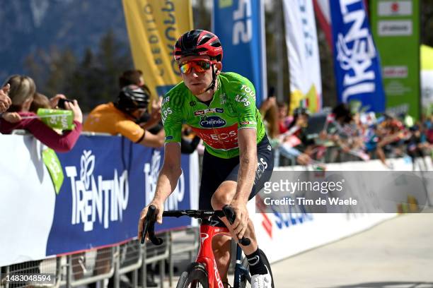 Tao Geoghegan Hart of United Kingdom and Team INEOS Grenadiers - Green leader jersey celebrates at finish line as stage winner during the 46th Tour...