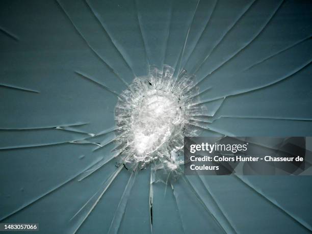 an opaque window shattered by an impact in paris, france - broken glass car stock pictures, royalty-free photos & images