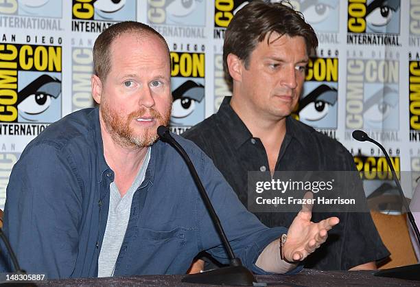 Joss Whedon and Nathan Fillion speak onstage at the "Firefly" 10 Year Anniversary Reunion Press Conference during Comic-Con International 2012 held...