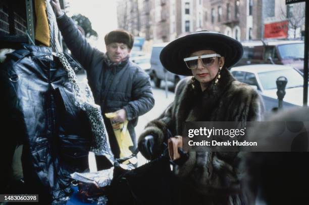 Woman wearing a fur coat shopping in Brighton Beach - a neighbourhood in Brooklyn nicknamed 'Little Odessa' due to its high population of...